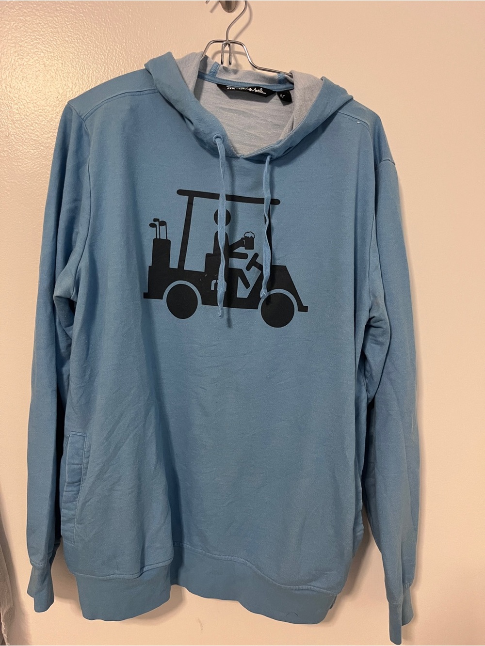 Travis Mathew Light Blue Crewneck Hoodie with Golf Cart Graphic